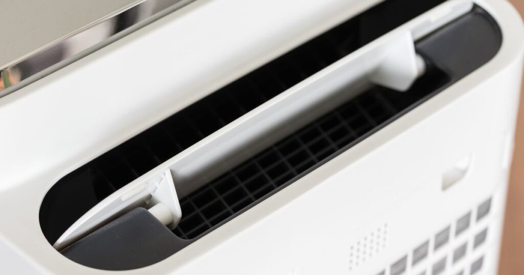 Closeup shot of an air purifier that has been turned on.