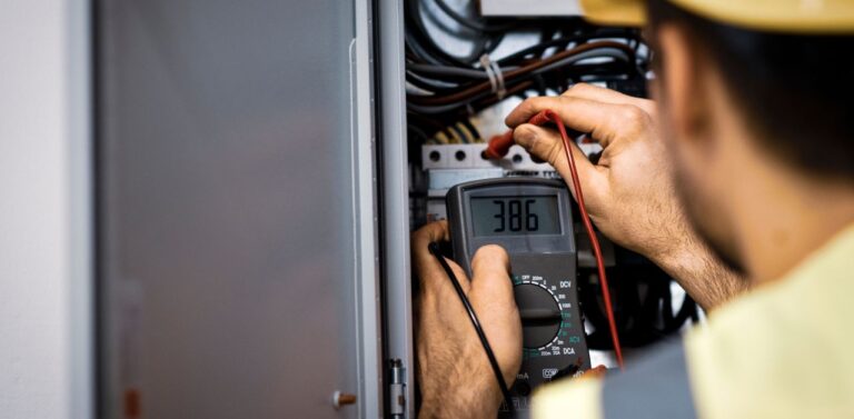 A man performing Electrical Safety Inspections.