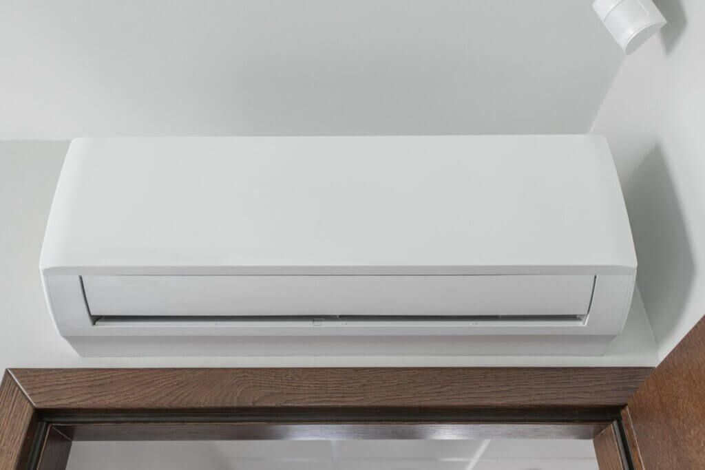 Low angle shot of a split type air conditioner.